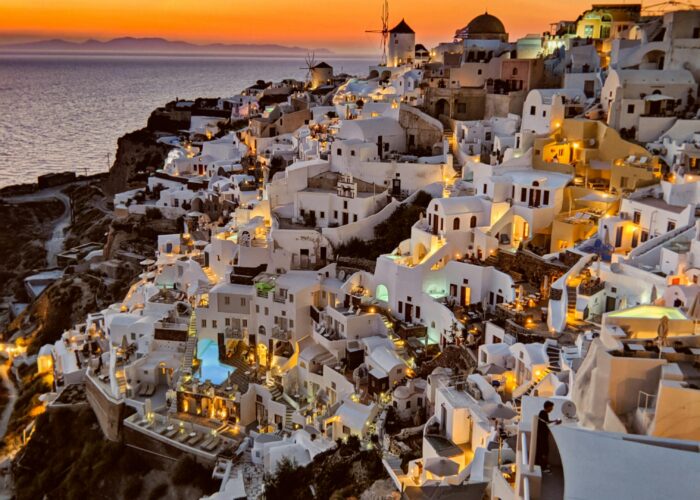 oia village night take with lights by santorini local guides