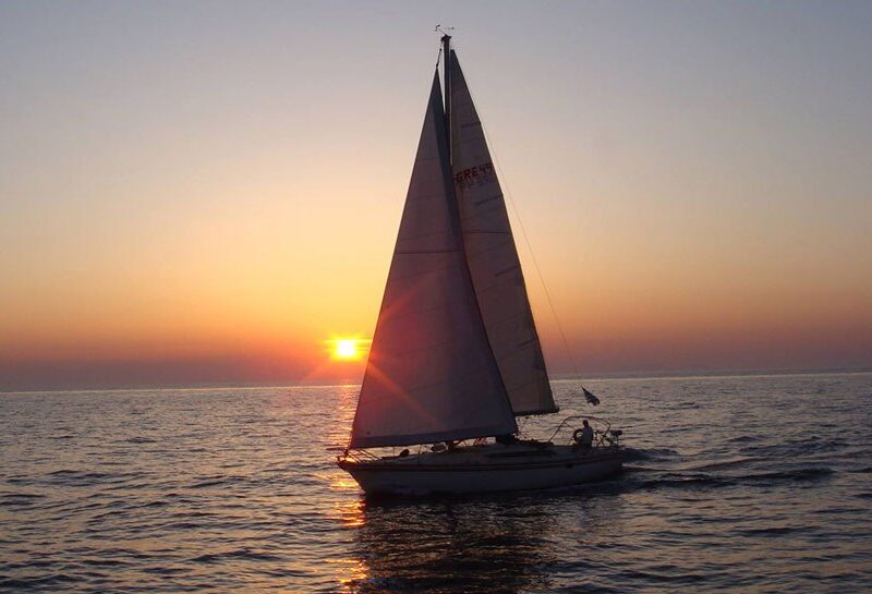 Sailing in Santorini during sunset