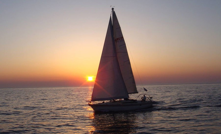 Sailing in Santorini during sunset