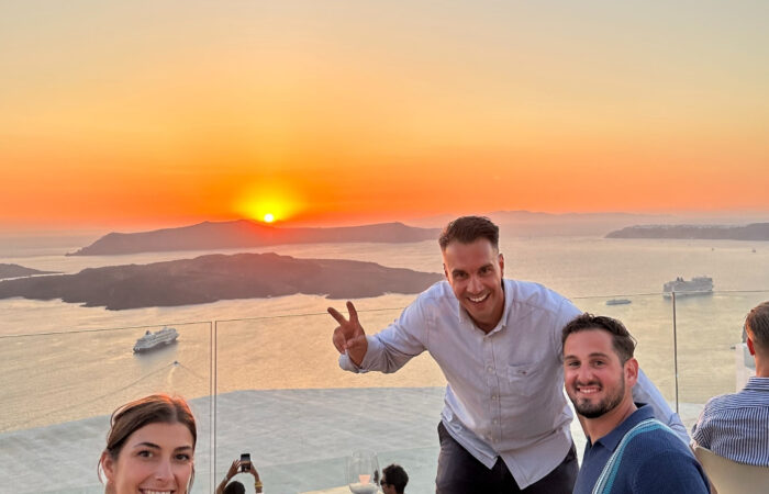 Enjoy your wine while watching the magnificent sunset in Santorini